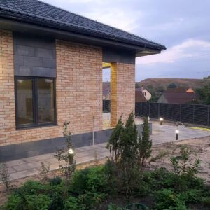 Completed House Cladding with Cerrad Piatto Sand Tiles and XPS Insulation
