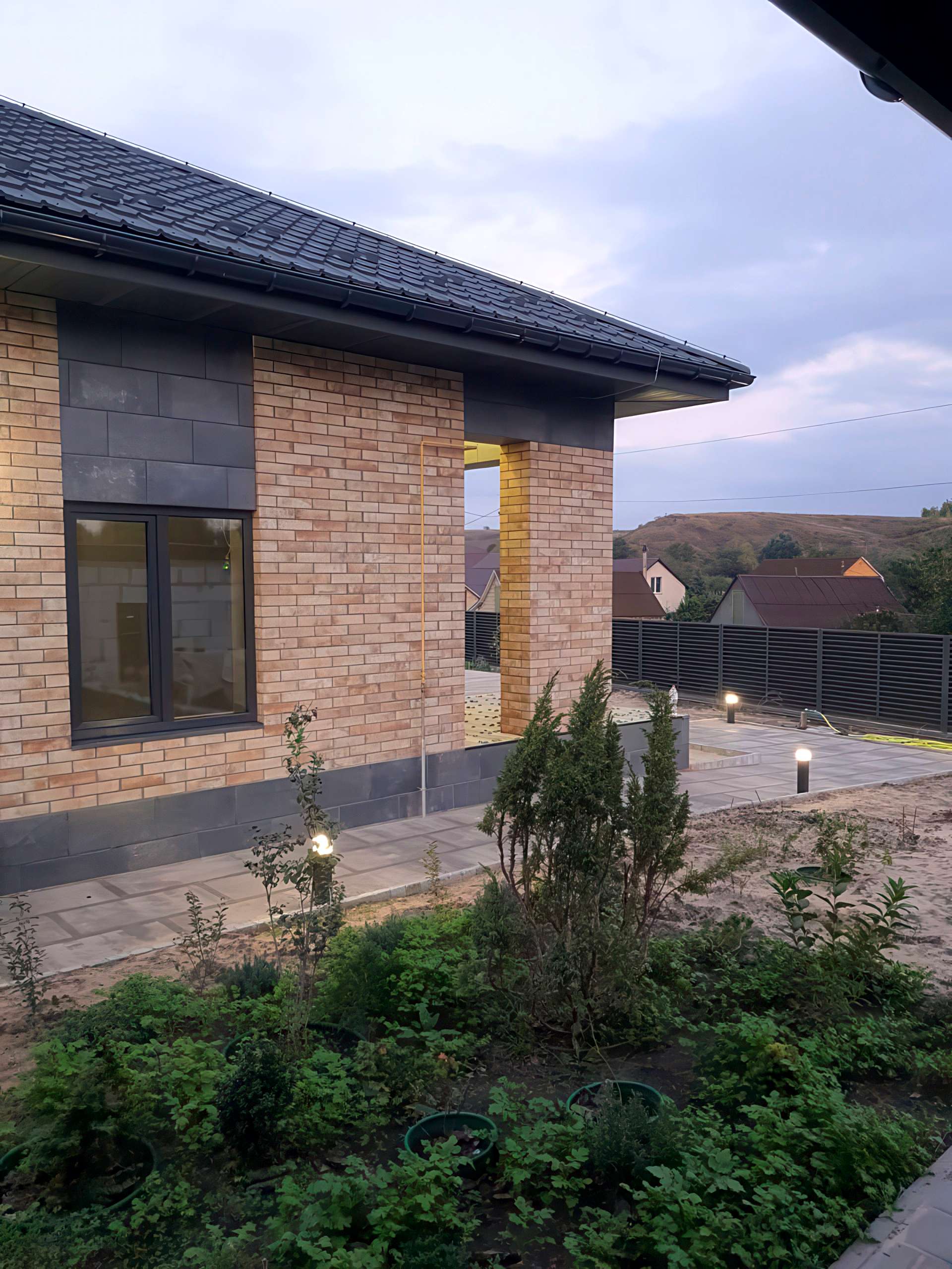 Completed House Cladding with Cerrad Piatto Sand Tiles and XPS Insulation