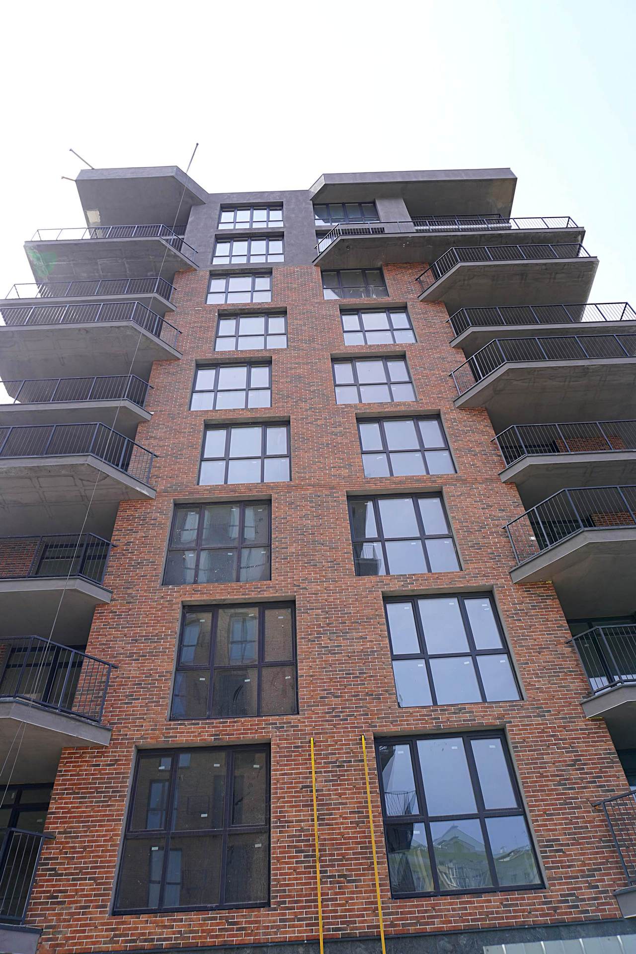 Exterior transformation with Loft Brick Chili tiles for bold design