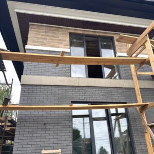 Professional installation of insulated wall panels for private house