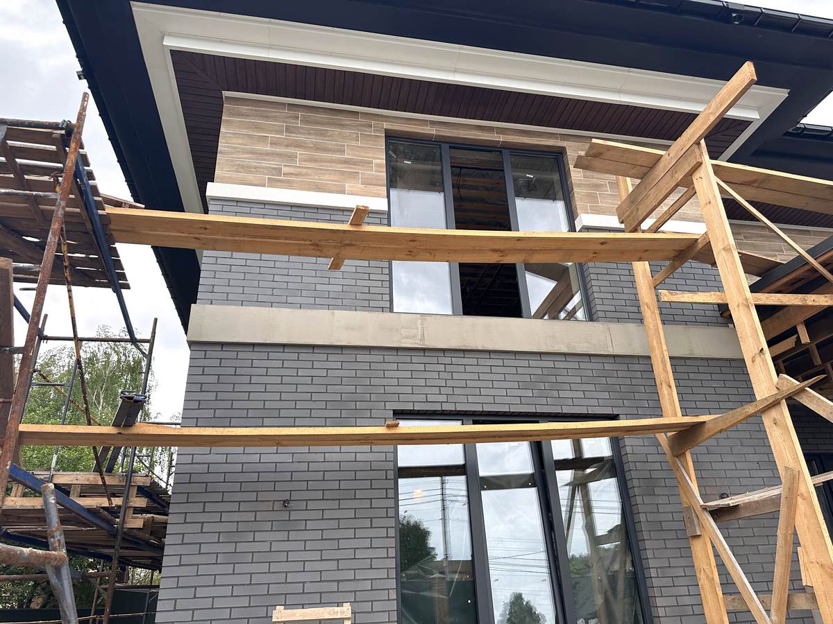 Professional installation of insulated wall panels for private house