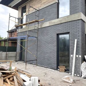 Premium facade design combining King Klinker and Cerrad panels