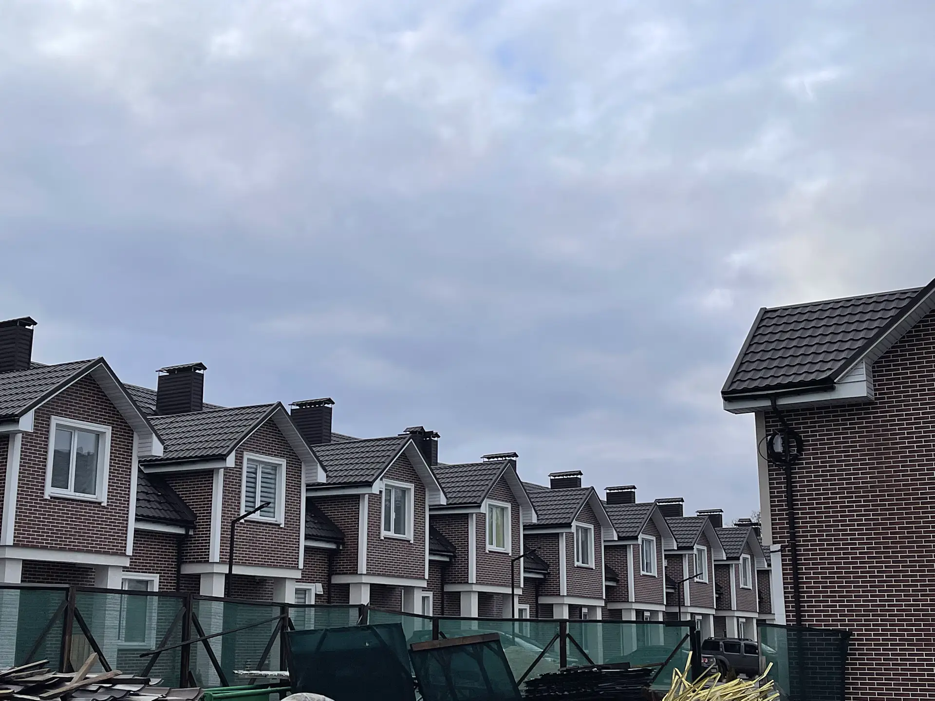 Energy-efficient building exterior finished with durable thermopanels