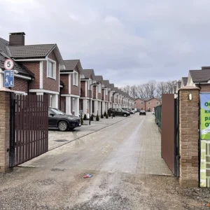 Elegant red clinker tile facade with contrasting white grout lines