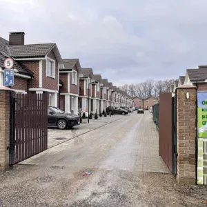 Elegant red clinker tile facade with contrasting white grout lines