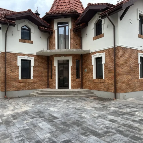 Final look of the insulated and upgraded house facade